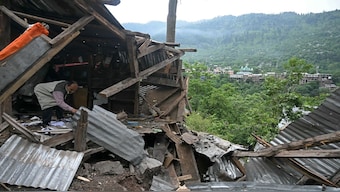 A resident inspects the debris of his house that was destroyed by Pakistani artillery shelling at the Lagama village in Uri, about 100 km from Srinagar, on May 9. Pakistan launched a swarm of drones and missiles on India in retaliation to Operation Sindoor. AFP