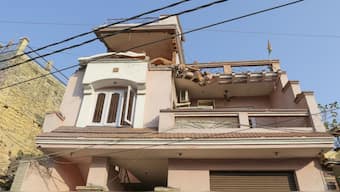 A house damaged after an attack from Pakistan, in a residential area of Jammu. PTI