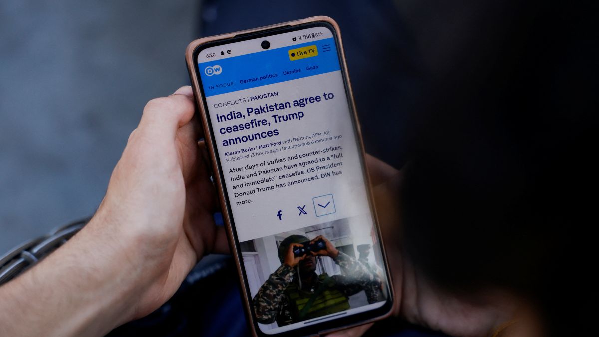 A man reads news on his mobile phone after the ceasefire announcement between India and Pakistan, in Srinagar May 10. The two sides have agreed to a 'conditional' truce after four days of escalation. Reuters A man reads news on his mobile phone after the ceasefire announcement between India and Pakistan, in Srinagar May 10. The two sides have agreed to a 'conditional' truce after four days of escalation. Reuters