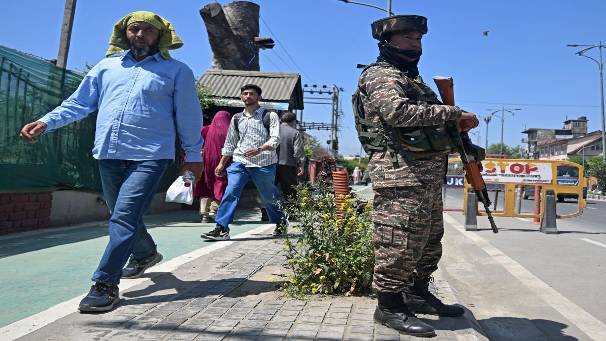 An Indian paramilitary trooper stands guard as commuters walk along a street in Srinagar. Prime Minister Narendra Modi has given the military "operational freedom" to respond to a deadly attack in Kashmir that New Delhi has blamed on arch-rival Pakistan. AFP An Indian paramilitary trooper stands guard as commuters walk along a street in Srinagar. Prime Minister Narendra Modi has given the military "operational freedom" to respond to a deadly attack in Kashmir that New Delhi has blamed on arch-rival Pakistan. AFP