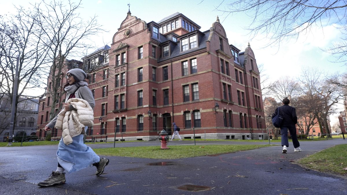 People walk between buildings on the campus of Harvard University in Cambridge. File image/AP People walk between buildings on the campus of Harvard University in Cambridge. File image/AP