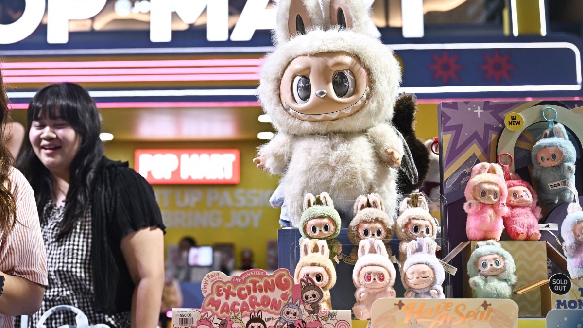 People look at collectable designer art toy Labubu at a Pop Mart pop-up store in Siam Center shopping mall in Bangkok on May 6, 2025.  AFP People look at collectable designer art toy Labubu at a Pop Mart pop-up store in Siam Center shopping mall in Bangkok on May 6, 2025.  AFP