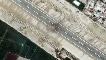 A damaged runway at Rahim Yar Khan air base in Southern Punjab, Pakistan. Reuters