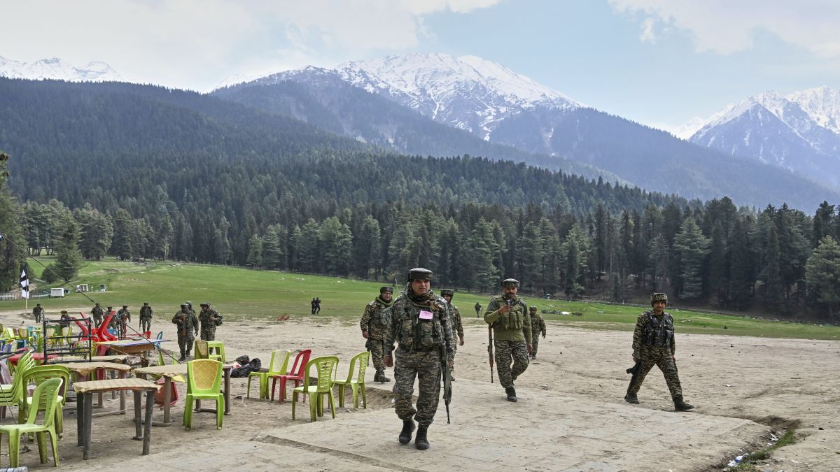 Indian security officers inspect the site a day after where terrorists indiscriminately opened fire at tourists in Pahalgam. AP File Indian security officers inspect the site a day after where terrorists indiscriminately opened fire at tourists in Pahalgam. AP File