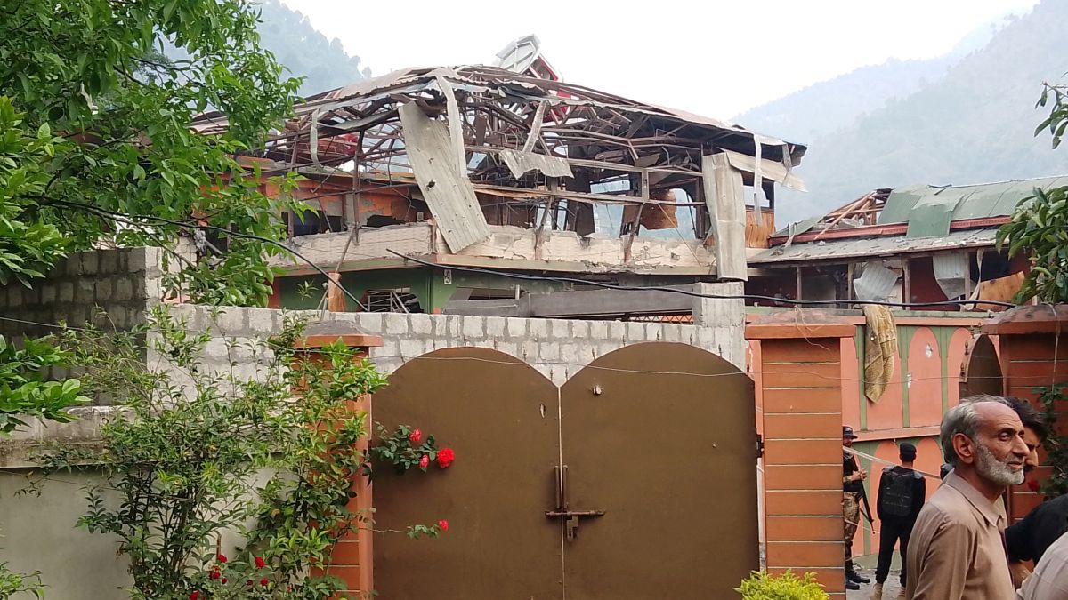 A damaged portion of a building is seen after it was hit by an Indian strike in Muzaffarabad in PoK. The city is a hub of terror activities. Reuters A damaged portion of a building is seen after it was hit by an Indian strike in Muzaffarabad in PoK. The city is a hub of terror activities. Reuters
