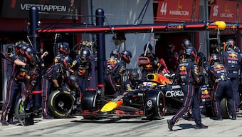 Red Bull's Max Verstappen makes a pit stop during a race. Image: Reuters