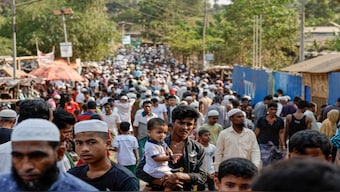 Rohingya refugees gather at roadside kitchen market, at the refugee camp in Cox's Bazar, Bangladesh, March 15, 2025. Image: REUTERS/Mohammad Ponir Hossain 