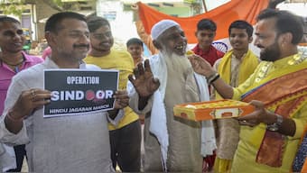 People celebrate the Indian Armed Forces' missile strikes on terror targets in Pakistan and Pakistan-occupied Kashmir (PoK) under 'Operation Sindoor', in retaliation to the Pahalgam terror attack, in Mirzapur. PTI