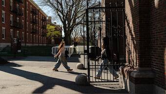 People enter and exit Harvard University in Cambridge, Massachusetts. The the US has taken a decision to pause student visa interviews globally. File image/AFP