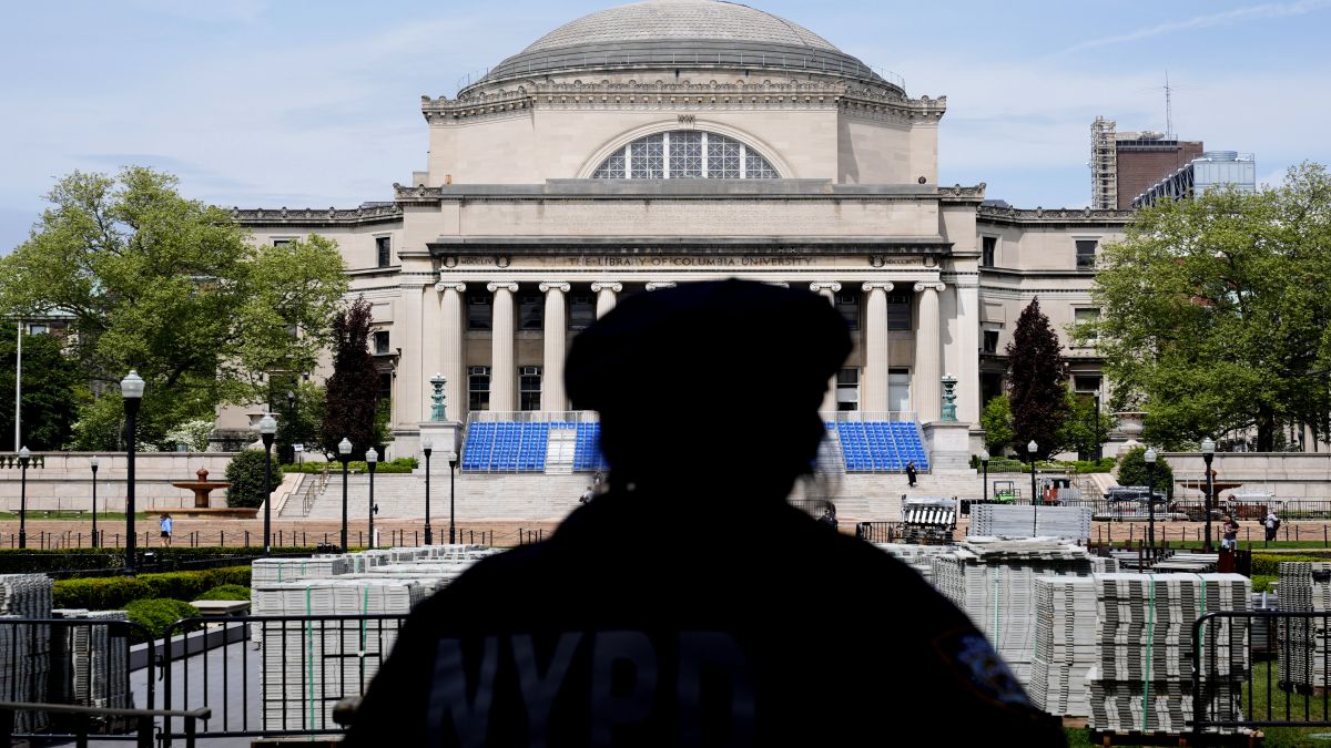 A New York City police officer looks over the centre of Columbia University in New York. File image/AP A New York City police officer looks over the centre of Columbia University in New York. File image/AP