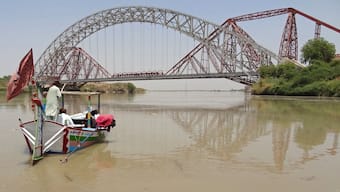People take a boat ride in the waters of Indus River near the Lansdowne Bridge in Sukkur, in the southern Sindh province. After the deadly Pahalgam attack, India has suspended the Indus Waters Treaty with Pakistan, with Islamabad warning any attempt to stop water flows would be considered an "act of war". AFP