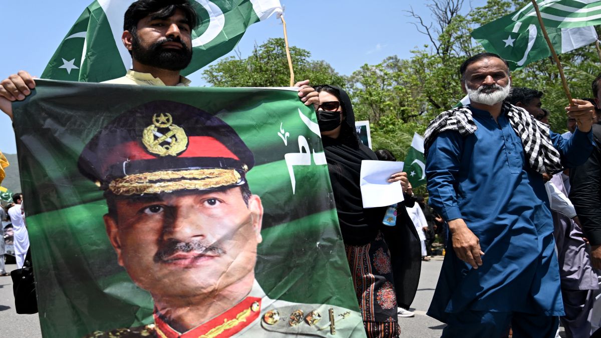 A man carries a portrait of Pakistani army chief General Syed Asim Munir, during a rally to express solidarity with Pakistan's armed forces, in Islamabad. This week, Munir became only the second in the country's history to be elevated to Field Marshal. AFP A man carries a portrait of Pakistani army chief General Syed Asim Munir, during a rally to express solidarity with Pakistan's armed forces, in Islamabad. This week, Munir became only the second in the country's history to be elevated to Field Marshal. AFP