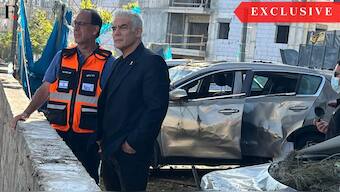 Israel's Leader of Opposition Yair Lapid looks at the destruction caused by the Iranian strikes. Image Source: Yair Lapid, obtained by Firstpost