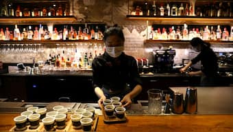 A barista serves coffee at a Starbucks flagship store in Beijing, China. File image/ Reuters