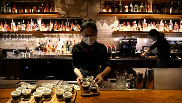 Starbucks posts first global sales growth in 18 months, high coffee prices erode profits