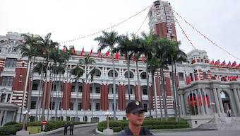 Security guards stand guard in front of the Presidential Office Building in Taipei, Taiwan. File image/ Reuters