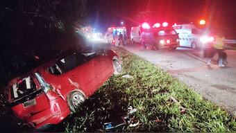 This handout photo taken and released by Perak's Fire and Rescue Department on June 9, 2025 shows a minivan after it collided with a bus in Gerik-Jeli, in Malaysia's Perak state.  AFP