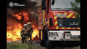 This handout photograph taken and released by the State Emergency Service of Ukraine on June 21, 2025, shows firefighters extinguishing a fire following a Russian night strike in the Kremenchuk district of the Poltava region. AFP Photo