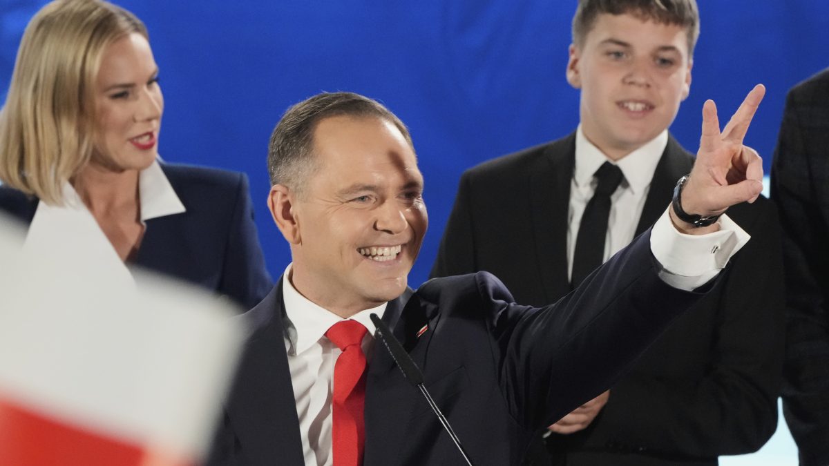 Presidential candidate Karol Nawrocki, a conservative historian backed by the right-wing Law and Justice party greets supporters as he arrives at his headquarters after the presidential election runoff in Warsaw, Poland. AP Presidential candidate Karol Nawrocki, a conservative historian backed by the right-wing Law and Justice party greets supporters as he arrives at his headquarters after the presidential election runoff in Warsaw, Poland. AP