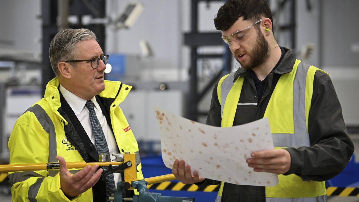 Britain's Prime Minister Keir Starmer, left, speaks to a member of staff during a visit to the BAE Systems'Govan facility, in Glasgow, Scotland. AP Britain's Prime Minister Keir Starmer, left, speaks to a member of staff during a visit to the BAE Systems'Govan facility, in Glasgow, Scotland. AP