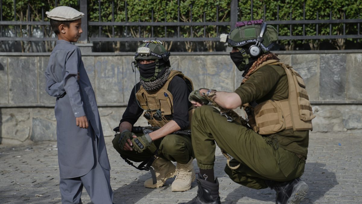 Taliban fighters speak with a boy during the Eid al-Adha prayers the Shah-Do Shamshira Mosque in Kabul, Afghanistan. AP Taliban fighters speak with a boy during the Eid al-Adha prayers the Shah-Do Shamshira Mosque in Kabul, Afghanistan. AP