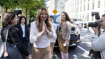 Nicole Daedone, center, founder and former CEO of OneTaste, leaves Brooklyn federal court on Tuesday in New York. AP