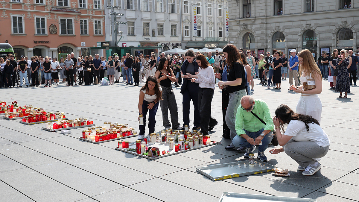 People light candles in honour of the victims of a deadly shooting at a secondary school, at the main square in Graz, Austria, June 11, 2025. Reuters People light candles in honour of the victims of a deadly shooting at a secondary school, at the main square in Graz, Austria, June 11, 2025. Reuters