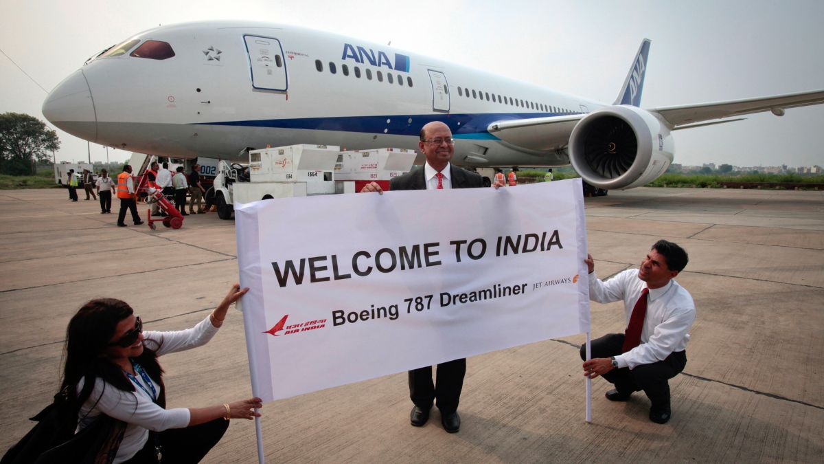Then-Boeing India President Dinesh Keskar (C) poses in front of the Boeing 787 Dreamliner aircraft for All Nippon Airways (ANA) after its India debut landing at the Indira Gandhi international airport in New Delhi, July 13, 2011. File Image/Reuters Then-Boeing India President Dinesh Keskar (C) poses in front of the Boeing 787 Dreamliner aircraft for All Nippon Airways (ANA) after its India debut landing at the Indira Gandhi international airport in New Delhi, July 13, 2011. File Image/Reuters