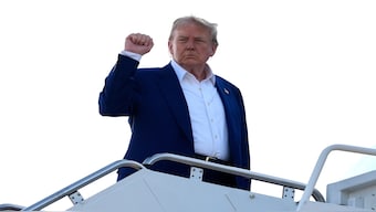President Donald Trump boards Air Force One at Joint Base Andrews, Md. on Tuesday. AP