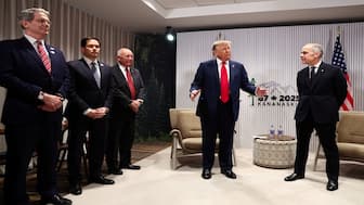 US Treasury Secretary Scott Bessent, Secretary of State Marco Rubio and US Ambassador to Canada Pete Hoekstra attend a meeting between US President Donald Trump and Canadian Prime Minister Mark Carney, at the G7 summit in Kananaskis, Alberta, Canada, on Monday. Reuters