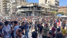 Palestinians say local gunmen, Israeli troops opened fire near US-backed aid centre