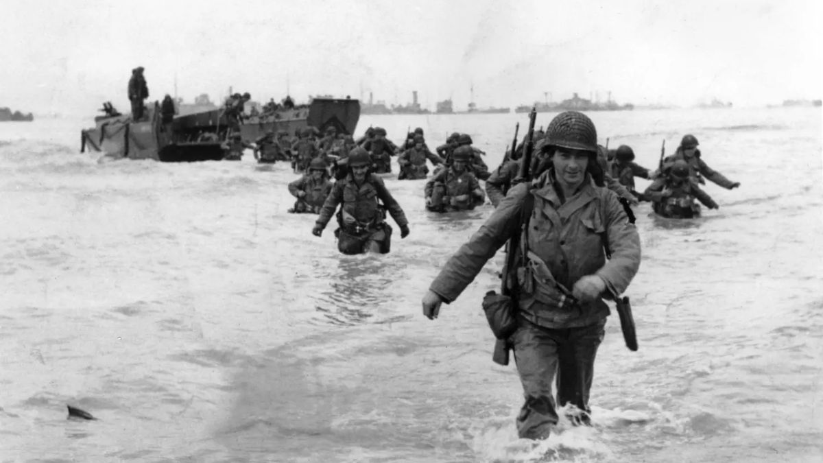 US infantrymen wade through the surf as they land at Normandy in 1944. File image/AP US infantrymen wade through the surf as they land at Normandy in 1944. File image/AP