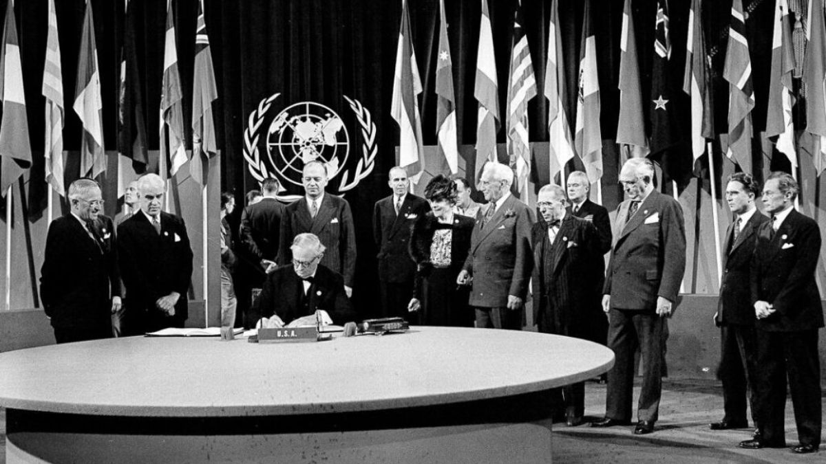 President Harry S. Truman and the entire American delegation look on as Sen. Tom Connally signs the United Nations Charter in San Francisco, June 26, 1945. File image/AP President Harry S. Truman and the entire American delegation look on as Sen. Tom Connally signs the United Nations Charter in San Francisco, June 26, 1945. File image/AP