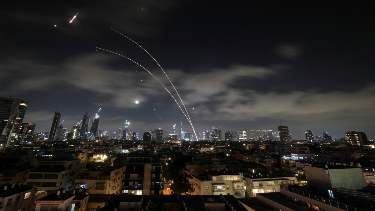 Israeli air defense system fires to intercept missiles during an Iranian attack over Tel Aviv, Israel, early Wednesday, June 18, 2025. (AP Photo/Leo Correa) Israeli air defense system fires to intercept missiles during an Iranian attack over Tel Aviv, Israel, early Wednesday, June 18, 2025. (AP Photo/Leo Correa)