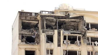 This picture shows a building damaged in an Israeli strike on Tehran on Friday. AFP
