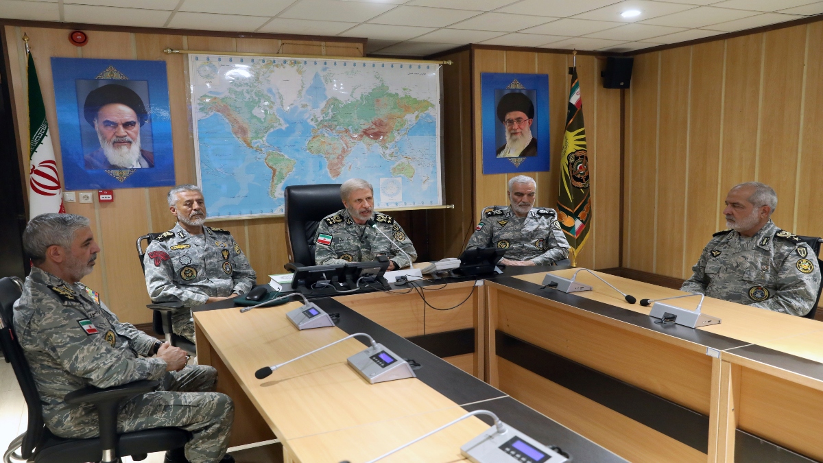 In this photo released on Monday by Iranian army press service, Iran's army commander-in-chief Gen. Amir Hatami, center, accompanied by high ranked army commanders, speaks in a video call with top commanders of the army, in Zolfaghar central headquarters, Iran, as portraits of the late revolutionary founder Ayatollah Khomeini, left, and Supreme Leader Ayatollah Ali Khamenei hang on the wall. AP In this photo released on Monday by Iranian army press service, Iran's army commander-in-chief Gen. Amir Hatami, center, accompanied by high ranked army commanders, speaks in a video call with top commanders of the army, in Zolfaghar central headquarters, Iran, as portraits of the late revolutionary founder Ayatollah Khomeini, left, and Supreme Leader Ayatollah Ali Khamenei hang on the wall. AP