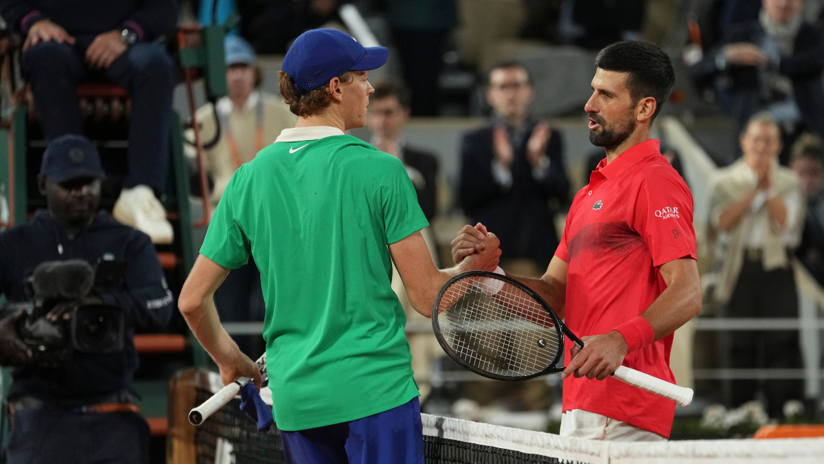 World No 1 Jannik Sinner shakes Novak Djokovic's hand after defeating the 24-time Grand Slam champion in the semi-finals of the French Open on Friday, 6 June. AP World No 1 Jannik Sinner shakes Novak Djokovic's hand after defeating the 24-time Grand Slam champion in the semi-finals of the French Open on Friday, 6 June. AP