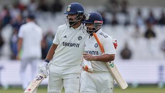 KL Rahul congratulates Rishabh Pant after the latter brought up his century on Day 4 of the first Test against England in Headingley. AP