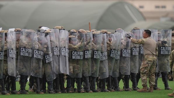 Marines in LA can detain protesters, says top US general, as more cities brace for protests