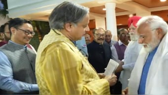 Prime Minister Narendra Modi with Congress leader Shashi Tharoor during his meeting with members of multi-party delegations, who had visited various countries as part of the Operation Sindoor outreach initiative. ANI