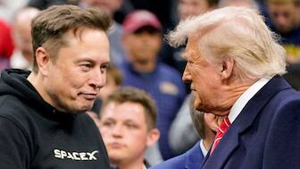 Elon Musk greets US President Donald Trump as they attend the NCAA men's wrestling championships in Philadelphia, Pennsylvania, US, March 22, 2025. File Image/Reuters