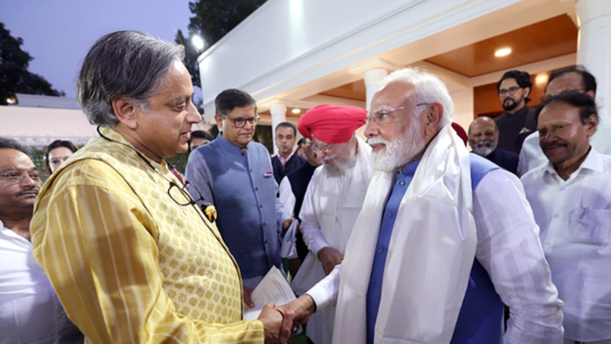 Prime Minister Narendra Modi greets Congress MP Shashi Tharoor with a handshake while hosting members of the delegation involved in the global outreach for Operation Sindoor. Image: PMO Prime Minister Narendra Modi greets Congress MP Shashi Tharoor with a handshake while hosting members of the delegation involved in the global outreach for Operation Sindoor. Image: PMO