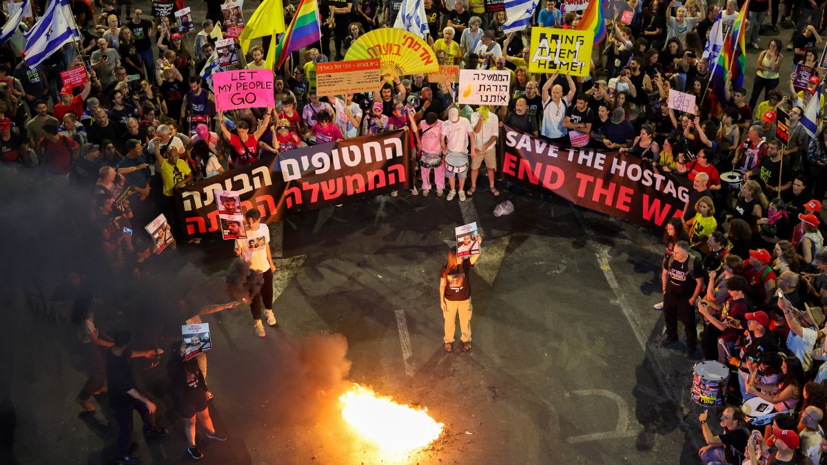 Demonstrators set fire to placards during an anti-government protest calling for action to secure the release of Israeli hostages held captive since the October 7, 2023 attacks by Palestinian militants, in front of the Defence Ministry in Tel Aviv on May 31, 2025. - AFP Demonstrators set fire to placards during an anti-government protest calling for action to secure the release of Israeli hostages held captive since the October 7, 2023 attacks by Palestinian militants, in front of the Defence Ministry in Tel Aviv on May 31, 2025. - AFP
