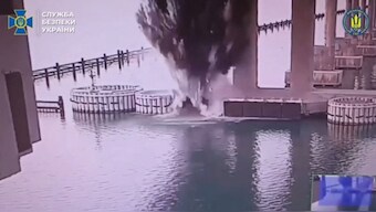 This video grab taken from a handout footage released by the Ukrainian Security Service shows the explosion of the Kerch Bridge connecting Crimea with Russia (AFP)
