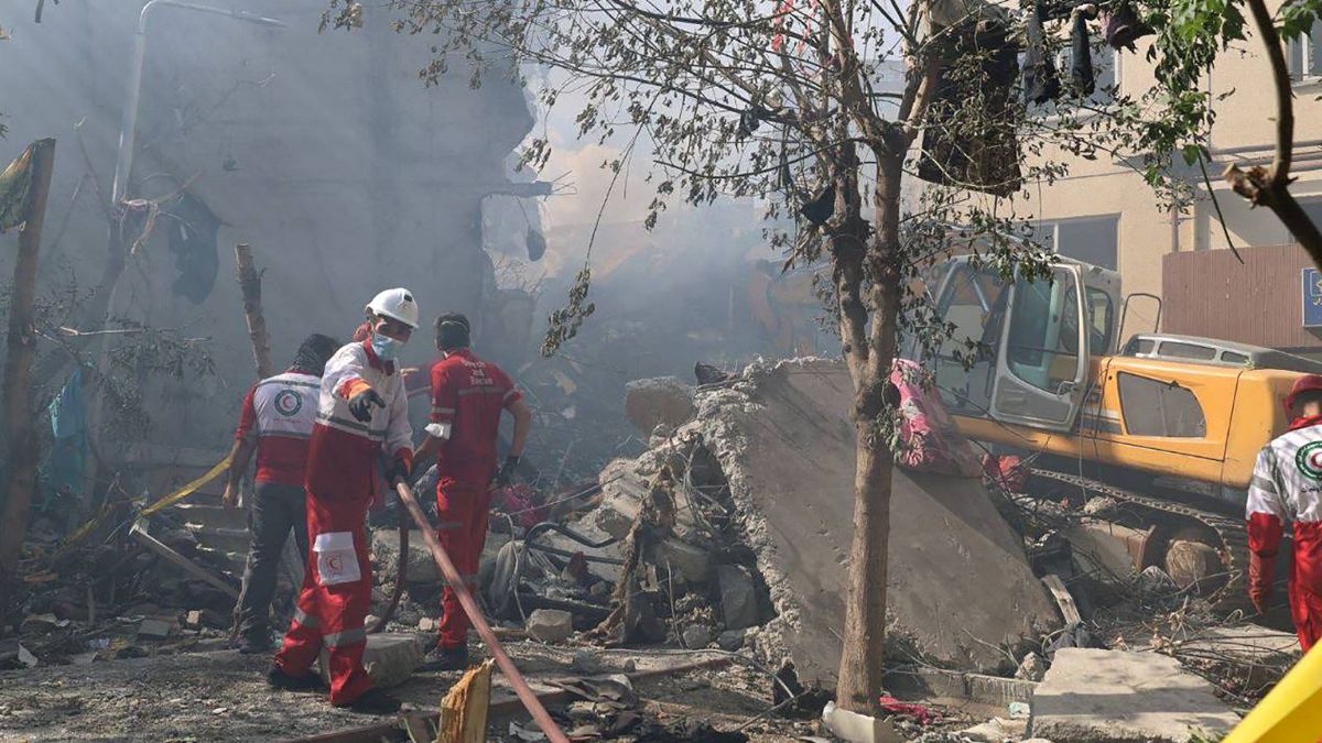 This handout picture released by the Iranian Red Crescent on June 14, 2025, show Iranian Red Crescent volunteers working in a Tehran neighbourhood hit by a reported Israeli strike. Image- AFP This handout picture released by the Iranian Red Crescent on June 14, 2025, show Iranian Red Crescent volunteers working in a Tehran neighbourhood hit by a reported Israeli strike. Image- AFP