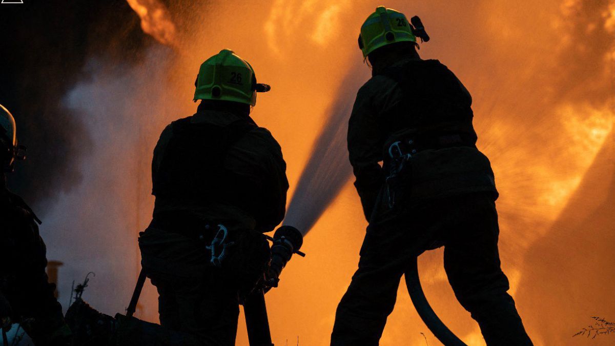 This handout photograph taken and released by the State Emergency Service of Ukraine on June 21, 2025, shows firefighters extinguishing a fire following a Russian night strike in the Kremenchuk district of the Poltava region. Image- AFP This handout photograph taken and released by the State Emergency Service of Ukraine on June 21, 2025, shows firefighters extinguishing a fire following a Russian night strike in the Kremenchuk district of the Poltava region. Image- AFP