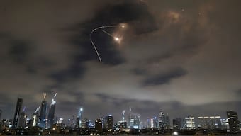 Israeli air defense system fires to intercept missiles during an Iranian attack over Tel Aviv, Israel, Saturday, June 21, 2025. (AP Photo)
