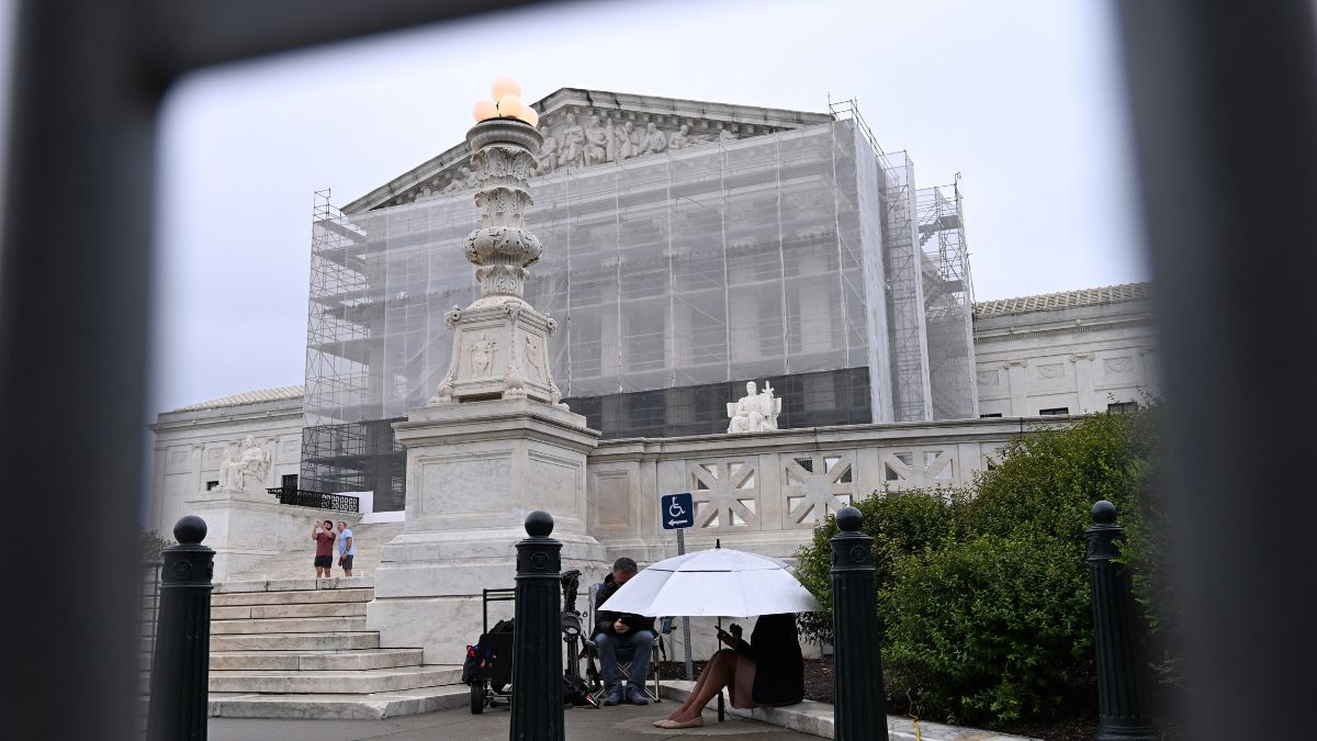 Journalists sit outside the US Supreme Court in Washington, DC, on June 27, 2025.  AFP Photo Journalists sit outside the US Supreme Court in Washington, DC, on June 27, 2025.  AFP Photo