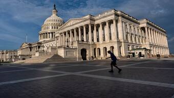 The Senate side of the Capitol is seen in Washington, early Monday as Republicans plan to begin a final push to advance President Donald Trump's big tax breaks and spending cuts package. AP