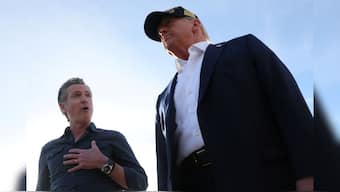 Governor of California Gavin Newsom speaks next to US President Donald Trump upon Trump's arrival to tour areas impacted or destroyed by the southern California wildfires, at Los Angeles International Airport in Los Angeles, California, US, January 24, 2025. File Image/Reuters